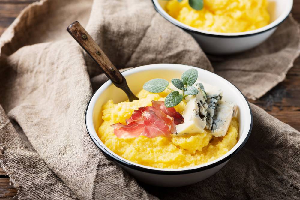 Rezept Polenta mit Bergkäse und Speck - Genussland Südtirol